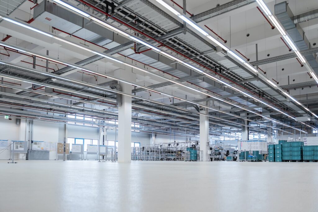 Illuminated warehouse of modern factory, Stuttgart, Germany